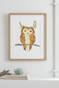 Decorative pressed flower owl wall art on a white background