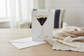 Pressed flower  of a espresso martini on a white background
