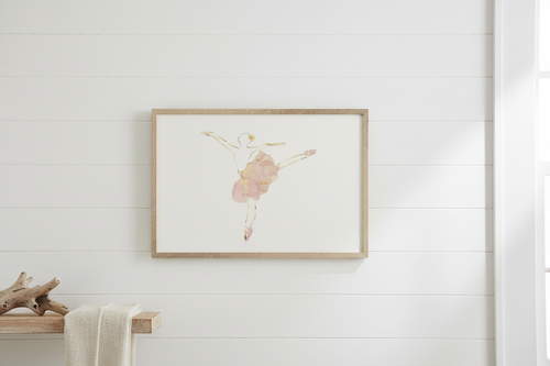 Framed artwork of a delicate floral design on a white background