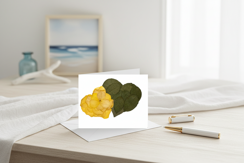 Greeting card with yellow flower and green leaves on a white background