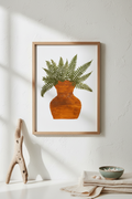 Pressed Fern in a terracotta pot with a wooden frame on a white background