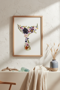 Floral whale tail art piece in a gold frame on a white background